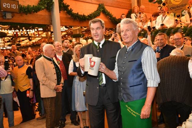 Markus Söder Prime Minister of Bavaria and Dieter Reiter Mayor of Munich Wiesn opening 2023 tapping Schottenhammel Theresienwiese Munich 16 September 2023