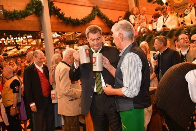 Markus Söder Prime Minister of Bavaria and Dieter Reiter Mayor of Munich Wiesn opening 2023 tapping Schottenhammel Theresienwiese Munich 16 September 2023