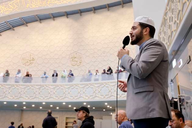 A muezzin calls for midday prayers at the DITIB Central Mosque in Ehrenfeld on Open Mosque Day At the Central Mosque in Cologne, a muezzin has been allowed to call for prayers via loudspeaker on Fridays since 2022 Topic image, symbol image Cologne, 03 10 2023 NRW Germany Copyright: xChristophxHardtx