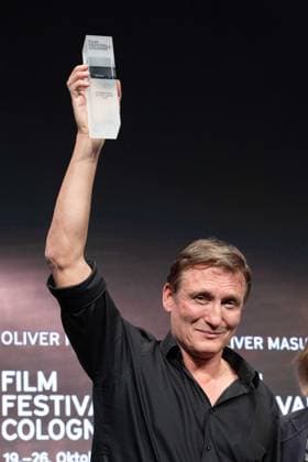 Actor Oliver MASUCCI, presents his award, laudator Gabriela SPERL, Actor Oliver MASUCCI receives the International Actors Award, Film Festival Cologne awards in Cologne, 26 10 2022