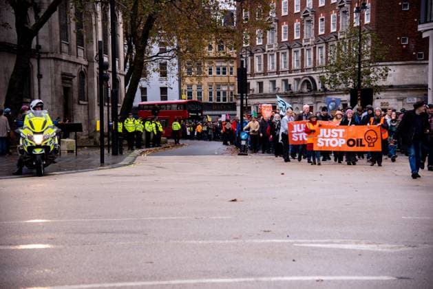 November 18, 2023, London, United Kingdom: A group of protestors hold banners during the demonstration. JUST STOP OIL organisers come together to demand an end to new oil and gas. They state that, The government is waging war on its people, and are fighting back. They re imprisoning peaceful protestors, protecting the real criminals, and licensing more than 100 new oil and gas projects. London United Kingdom - ZUMAs197 20231118_aaa_s197_041 Copyright: xLoredanaxSangiulianox