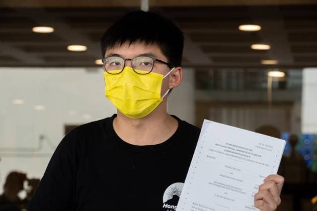 232157.jpg Joshua Wong speaks to reporters outside the High Court in Hong Kong on Wednesday Sept 23, 2020 after his application for a judicial review of his banning from last year EDITORIAL USE ONLY  Copyright: xx 232157 ALANSIUx eyepress101392
