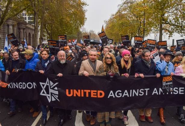 November 26, 2023, London, United Kingdom: Centre left to right: UK Chief Rabbi Ephraim Mirvis, actor Eddie Marsan, actress Tracy-Ann Oberman, TV presenter Rachel Riley and actress Maureen Lipman march behind a United against antisemitism banner during the demonstration on Victoria Embankment. Thousands of pro-Israel protesters marched in Central London against antisemitism and called for the release of Israeli hostages held by Hamas in Gaza. London United Kingdom - ZUMAs197 20231126_aaa_s197_442 Copyright: xVukxValcicx