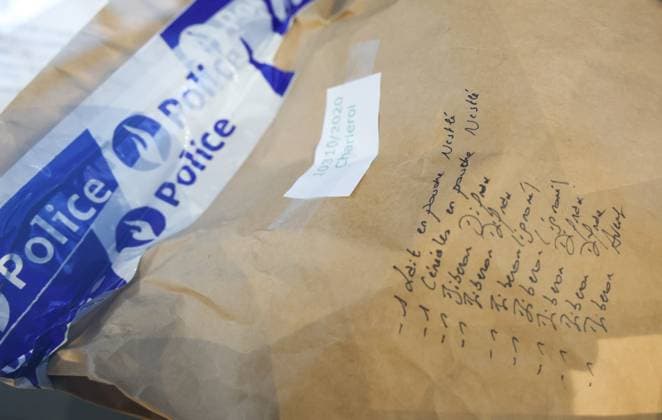 Pieces of evidence pictured during the jury constitution session at the assizes trial of Dambremont, before the Assizes Court of Hainaut Province, in Mons, on Thursday 30 November 2023. The 26 years old mother is accused of a murder attempt and the actual murder of her seven-month-old baby son Yann in 2019. VIRGINIExLEFOUR 81172083