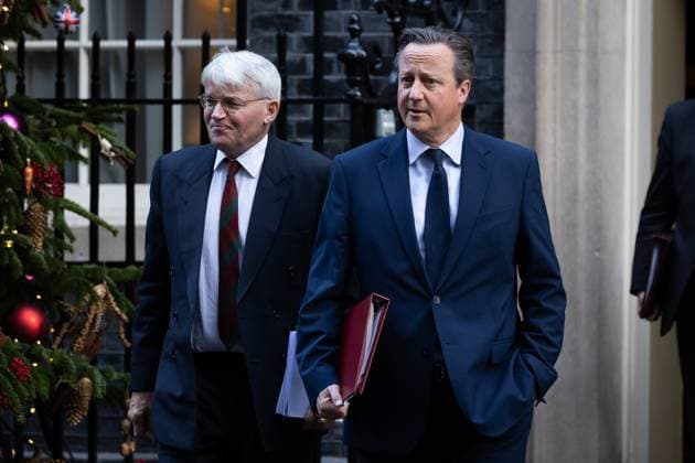 December 12, 2023, London, United Kingdom: Andrew Mitchell and Lord David Cameron leave 10 Downing Street after a cabinet meeting in London. Prime Minister Rishi Sunak is spending time trying to convince fellow Conservative MPs to support his emergency Rwanda Bill legislation ahead of a crucial vote. London United Kingdom - ZUMAs197 20231212_aaa_s197_062 Copyright: xTejasxSandhux