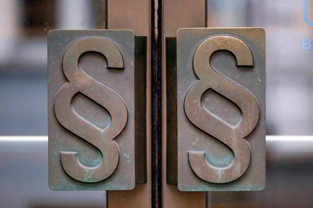 The doorknobs at Bonn District Court are in the form of paragraphs, as we know them from a legal context Themed image, symbolic image Bonn, 13 12 2023 NRW Germany Copyright: xChristophxHardtx
