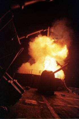 America Fires First Tomahawks to Take Down Taliban in response to 9 11 Attacks 7 OCTOBER 2001 -- NORTHERN ARABIAN SEA -- PHOTOGRAPH BY BARRY IVERSON-- THE FIRST TOMAHAWK MISSILE IS LAUNCHED OFF THE USS PHILIPPINE SEA IN THE NORTHERN ARABIAN SEA OFF THE COAST OF PAKISTON DURING OPERATION ENDURING FREEDOM TO TAKE DOWN THE TALIBAN IN AFGHANISTAN FOLLOWING THE ATTACKS BY BIN LADEN AND AL QAIDA AGAINST THE UNITED STATES ON 9 11. PHOTOGRAPH BY BARRY IVERSON Off the Coast of Pakistan NORTHERN ARABIAN SEA EDITORIAL USE ONLY Copyright: xx BarryxIversonxPhotographyx bivphotos003493