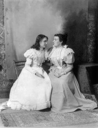 Helen Keller (l) and her teacher Anne Sulllivan Macy photograph by Notman. 1897 (b w photo) 1712482 Helen Keller (l) and her teacher Anne Sulllivan Macy photograph by Notman. 1897 (b w photo); (add.info.: Helen Keller (l) and her teacher Anne Sulllivan Macy in an undated picture, photograph by Notman. 1897. Helen Keller (1880-1968) born blind deaf mute, thanks to her governess she overcame this handicaps, studied and created in1921 the american foundation for the blind. Here she can hear Anne by feeling the vibrations of her lips). Copyright: xBridgemanxImagesx 1712482