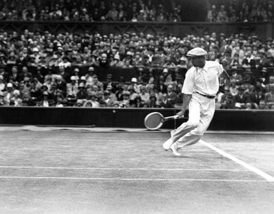 Rene Lacoste (b w photo) 1794777 Rene Lacoste (b w photo) by Unknown photographer, (20th century); Private Collection; (add.info.: french tennis player Rene Lacoste during match against Henri Cochet at Wimbledon tennis tournament in July 1928). Copyright: xBridgemanxImagesx 1794777