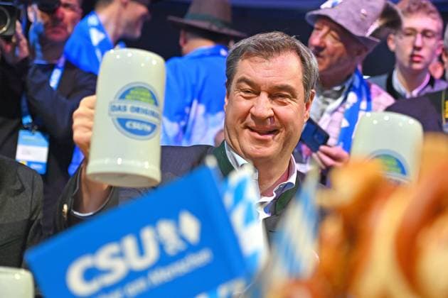 Markus SOEDER State Premier of Bavaria and CSU Chairman with mug of beer, toasting Political Ash Wednesday of the CSU on 14 02 2024 in the Dreilaenderhalle in Passau
