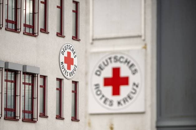 German Red Cross facade logo 25 02 24, Limburg Symbol photo, illustration image, symbol image, illustration photo German Red Cross facade logo A part of a building with the logo and lettering of the German Red Cross on the facade The characteristic colors and symbols of the German