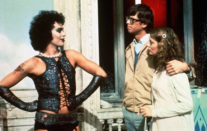 Tim Curry, Barry Bostwick, Susan Sarandon, The Rocky Horror Picture Show (1975). Photo credit: 20th Century Fox  Copyright: xCinemaxLegacyxCollection ThexHollywoodxArchivex 34580-681THA The Hollywood Archive
