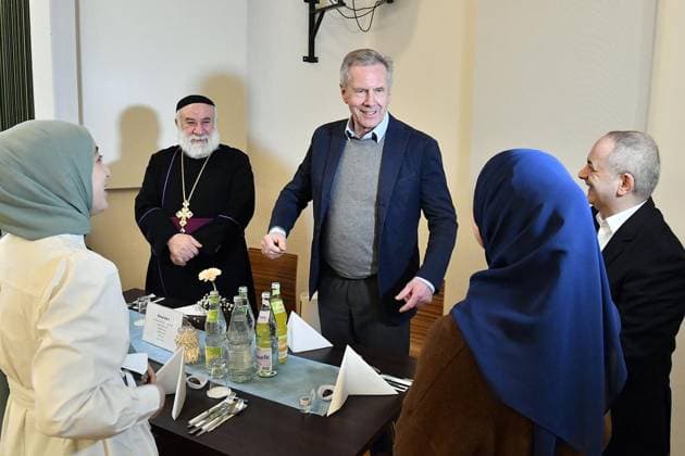 Interfaith breaking of the fast in Copyright: JürgenxTheobald doc7ujki2tikyq41r7m85t ,EDITORIAL USE ONLY Copyright: JürgenxTheobald