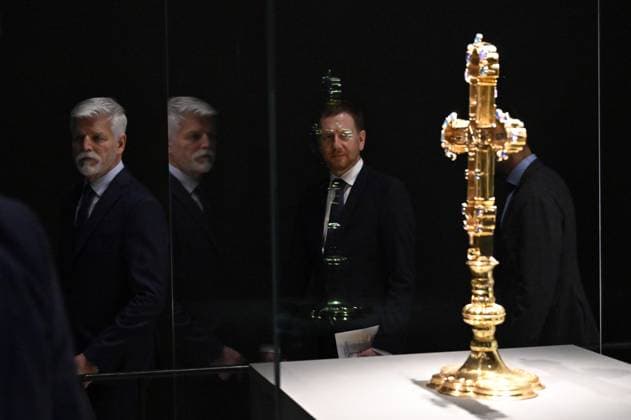 Czech President Petr Pavel, center, attends opening of exhibition entitled Fragments of Memory: The Treasury of St Vitus Cathedral in Prague, on March 15, 2024, in Dresden, Germany. On the center of the photo is seen Saxon Prime Minister Michael Kretschmer and in the foreground is seen Coronation Cross of Bohemia. (CTKxPhoto OndrejxHajek) CTKPhotoP2024031505892  CTKPhotoP2024031505892