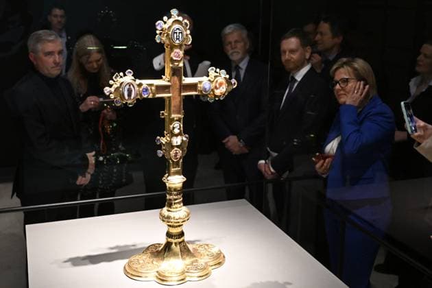 Czech President Petr Pavel, center, attends opening of the exhibition entitled Fragments of Memory: The Treasury of St Vitus Cathedral in Prague, on March 15, 2024, in Dresden, Germany. 2nd from right is seen Saxon Prime Minister Michael Kretschmer and in the foreground is seen Coronation Cross of Bohemia. (CTKxPhoto OndrejxHajek) CTKPhotoP2024031505831  CTKPhotoP2024031505831