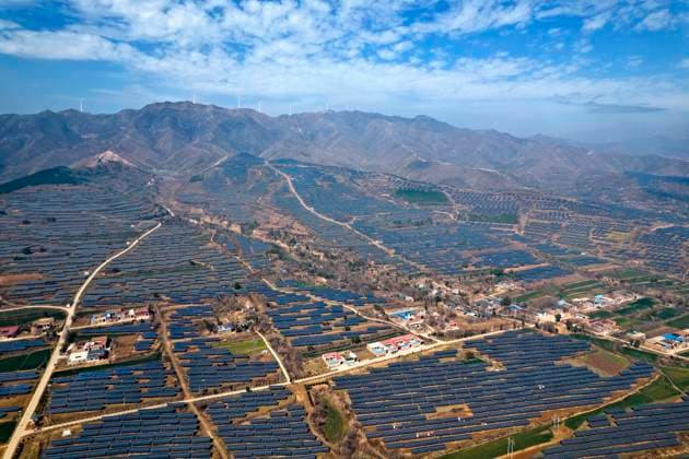 Ximo Photovoltaic Technology Base in Yuncheng YUNCHENG, CHINA - MARCH 19, 2023 - An aerial photo shows the grid-connected Ximo photovoltaic technology base in Yuncheng City, Shanxi Province, China, March 19, 2023. In recent years, Ruicheng County, Yuncheng City, Shanxi Province, adhering to the concept of green development, has built a leading photovoltaic technology base stretching more than 40 kilometers by taking advantage of abundant solar energy resources and a series of undeveloped hills and slopes along the mountains, continuously sending green electricity to thousands of households, further improving the ecological environment and realizing energy conservation and emission reduction. Yuncheng Shanxi China Copyright: xCFOTOx i1679277854891