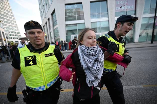 MALMÖ, SWEDEN 20240511 Climate activist Greta Thunberg is taken care of by police outside Malmö Arena in Malmö, Sweden, Saturday, May 11, 2024 The demonstration opposes Israels participation in the 68th edition of the Eurovision Song Contest ESC in Malmö Arena MALMÖ SWEDEN x50090x  Copyright: xJohanxNilsson TTx DEMONSTRATION EUROVISION SONG CONTEST MALMÖ Y5NoWnMCQtE