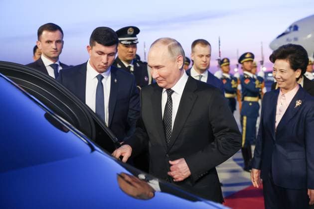 CHINA, BEIJING - MAY 15, 2024: Russia s President Vladimir Putin (C) is welcomed at a city airport. Alexander Ryumin POOL TASS  70071093