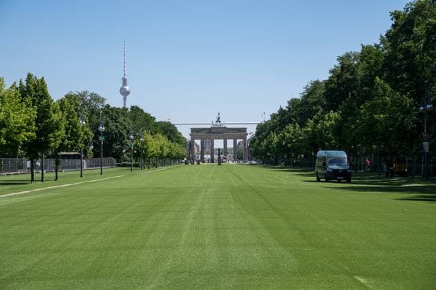 17 05 2024, Berlin, Germany, Europe Green artificial turf on the UEFA EURO 2024 fan mile in front of the Brandenburg Gate along Strasse des 17 Juni in Tiergarten
