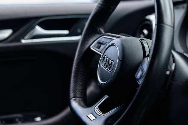 The logo of the car manufacturer Audi can be seen on the steering wheel of an A3 sedan Rottweil Baden Württemberg Germany