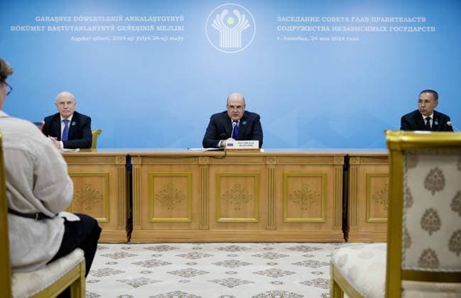 TURKMENISTAN, ASHGABAT - MAY 24, 2024: CIS Secretary General Sergei Lebedev, Russia s Prime Minister Mikhail Mishustin, and Hojamyrat Geldimyradow (L-R), Deputy Head of the Turkmenian Cabinet of Ministers, make press statements following an expanded meeting of the CIS Council of the Heads of Government. Dmitry Astakhov POOL TASS  70424358