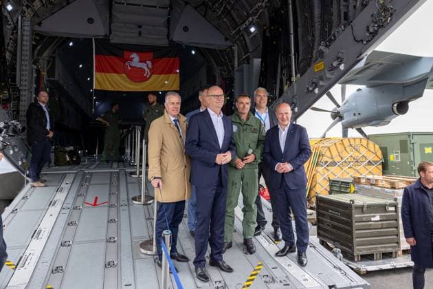ILA Berlin 2024 press tour Press tour before the start of the ILA 2024 with Dr. Dietmar Woidke Minister President Brandenburg , Kai Wegner Governing Mayor Berlin here with Colonel Kristof Conrath on the loading hatch of an Airbus A400M of the Air Force Schönefeld Selchow Brandenburg Germany 20240603-6V2A8333