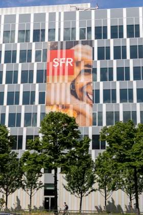 Saint Denis, France May 18, 2024 - Offices of telecommunications operator SFR ECONOMIE, SFR, TELCO, ILLUSTRATION, LOGO, BUREAUX, ENTREPRISE, BUSINESS, ALTICE, INTERNET, TELEPHONIE MOBILE, FAI, FOURNISSEUR D ACCES, FIBRE, HAUT DEBIT, PATRICK DRAHI  Copyright: xVincentxIsorex