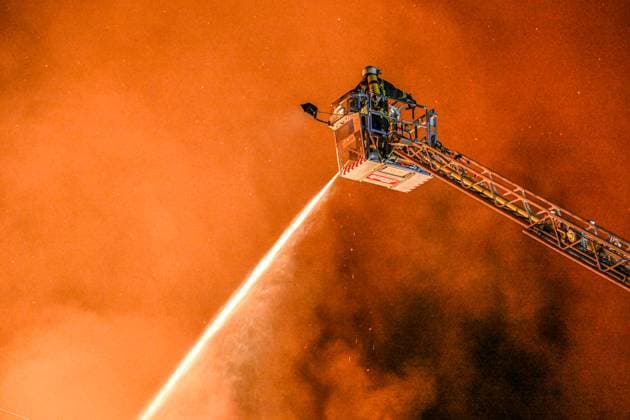 Fire in Gerstetten, firefighters hold fire hoses into the flames of a burning carpentry workshop During a major fire in the night near Gerstetten in the district of Heidenheim, the emergency services were severely challenged Gerstetten Baden Württemberg Germany Gussenstadt Copyright: x xonw-imagesx xMariusxBullingx