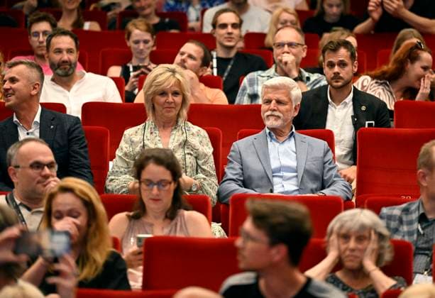 Czech President Petr Pavel, center-right, and his wife Eva Palova, center, attend presentation of Czech film Our Lovely Pig Slaughter during the 58th Karlovy Vary International Film Festival, on June 30, 2024, in Karlovy Vary, Czech Republic. On the left side is seen head of the presidential office Milan Vasina. (CTKxPhoto KaterinaxSulova) CTKPhotoP2024063005654  CTKPhotoP2024063005654