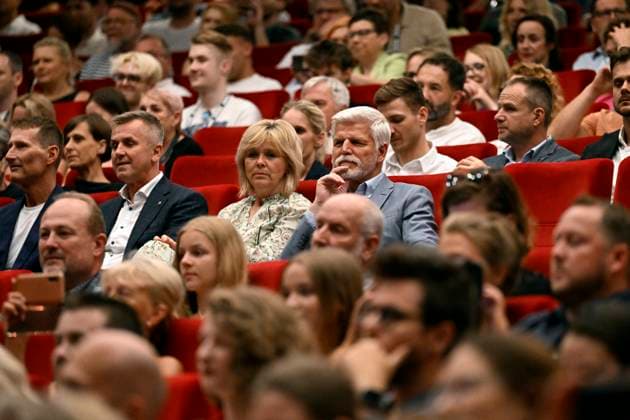 Czech President Petr Pavel, center-right, and his wife Eva Palova, center, attend presentation of Czech film Our Lovely Pig Slaughter during the 58th Karlovy Vary International Film Festival, on June 30, 2024, in Karlovy Vary, Czech Republic. 2nd from left in center row is seen head of the presidential office Milan Vasina. (CTKxPhoto KaterinaxSulova) CTKPhotoP2024063005691  CTKPhotoP2024063005691