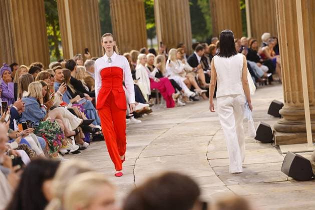 Models on the catwalk at the Marc Cain Pure Radiance fashion show on 2 07 2024 as part of Fashion Week Berlin in the Colonnade with Triumphtor at the Neues Palais in Potsdam Fashionweek Berlin 2024 Marc Cain Show