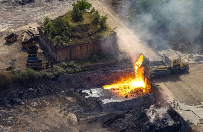 Aerial view, Duisburg North, dumping of red-hot material with a truck at the Acelor Mittal plant, Laar, Duisburg, Ruhr area, North Rhine-Westphalia, Germany ATTENTIONxMINDESTHONORARx60xEURO