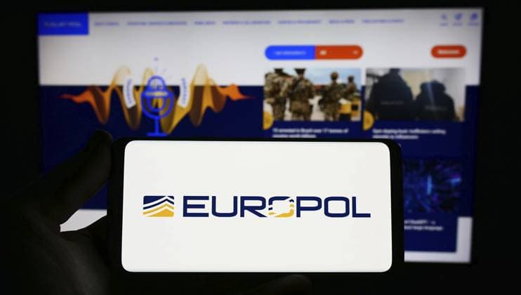 Stuttgart, Germany, 04 02 2023 Person Holding Smartphone With Logo of EU Law Enforcement Agency Europol ON Screen in Front of Website Focus ON Phone display, Europe Copyright: imageBROKER TimonxSchneider ibliqx10709350.jpg