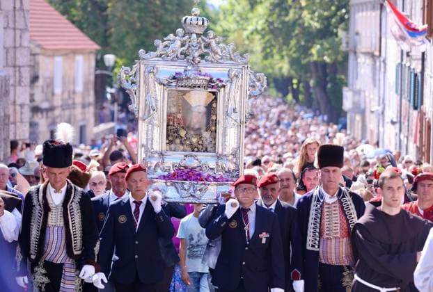 Blessed Virgin Mary celebration in Croatia Roman Catholic priests carry The painting of Miraculous Madonna of Sinj during a Feast of Assumption of the Blessed Virgin Mary celebration at Sinj, Croatia on August 15, 2024.  IvoxCagalj PIXSELL