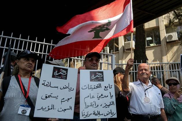 September 5, 2024, Beirut, Beirut, Lebanon: Depositors raise banners outside BeirutÃ¢â‚¬â ¢s judiciary palace that read: Ã¢â‚¬oeContinue the investigations and keep (Riad) Salameh detainedÃ¢â‚¬Â and Ã¢â‚¬oeRiad Salameh is a criminal and deserves life imprisonmentÃ¢â‚¬Â, during a gathering to demand the trial of Salameh, LebanonÃ¢â‚¬â ¢s former central bank governor who was arrested over embezzlement, money-laundering and fraud. Beirut Lebanon - ZUMAn313 20240905_zip_n313_007 Copyright: xMarwanxNaamanix