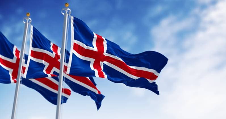 Close-up of three Iceland national flags waving Close-up of three Iceland national flags waving. Blue with a white cross and a red cross inside the white cross. Seamless 3d render animation. Slow motion loop. Selective focus Copyright: xZoonar.com ValerioxRosatix 22116659