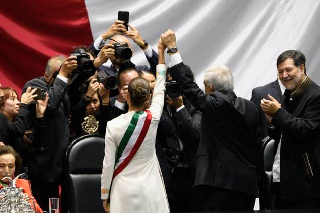 September 30, 2024, Mexico City, Mexico City, Mexico: President ANDRES MANUEL LOPEZ OBRADOR places the presidential sash on CLAUDIA SHEINBAUM at the plenary session of the Chamber of Deputies. Claudia Sheinbaum becomes the first woman in the position of president throughout the history of Mexico. Mexico City Mexico - ZUMAn296 20240930_zip_n296_007 Copyright: xJorgexNunezx