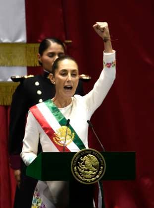 September 30, 2024, Mexico City, Mexico City, Mexico: President ANDRES MANUEL LOPEZ OBRADOR places the presidential sash on CLAUDIA SHEINBAUM at the plenary session of the Chamber of Deputies. Claudia Sheinbaum becomes the first woman in the position of president throughout the history of Mexico. Mexico City Mexico - ZUMAn296 20240930_zip_n296_011 Copyright: xJorgexNunezx