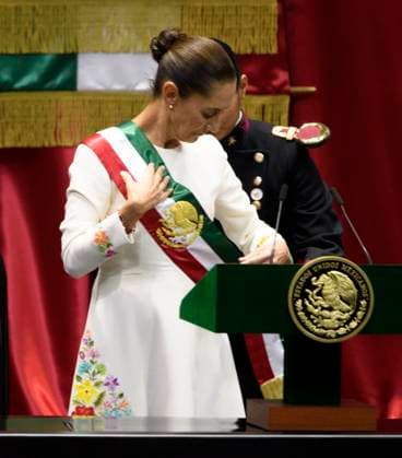 September 30, 2024, Mexico City, Mexico City, Mexico: President ANDRES MANUEL LOPEZ OBRADOR places the presidential sash on CLAUDIA SHEINBAUM at the plenary session of the Chamber of Deputies. Claudia Sheinbaum becomes the first woman in the position of president throughout the history of Mexico. Mexico City Mexico - ZUMAn296 20240930_zip_n296_012 Copyright: xJorgexNunezx