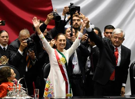 September 30, 2024, Mexico City, Mexico City, Mexico: President ANDRES MANUEL LOPEZ OBRADOR places the presidential sash on CLAUDIA SHEINBAUM at the plenary session of the Chamber of Deputies. Claudia Sheinbaum becomes the first woman in the position of president throughout the history of Mexico. Mexico City Mexico - ZUMAn296 20240930_zip_n296_014 Copyright: xJorgexNunezx