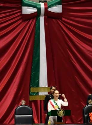 September 30, 2024, Mexico City, Mexico City, Mexico: President ANDRES MANUEL LOPEZ OBRADOR places the presidential sash on CLAUDIA SHEINBAUM at the plenary session of the Chamber of Deputies. Claudia Sheinbaum becomes the first woman in the position of president throughout the history of Mexico. Mexico City Mexico - ZUMAn296 20240930_zip_n296_015 Copyright: xJorgexNunezx