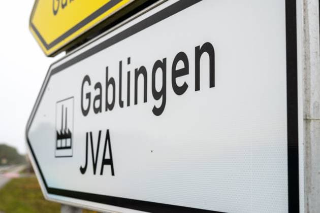 Gablingen, Augsburg Land, Bavaria, Germany - October 31, 2024: Symbolic image of the scandal and allegations of mistreatment by staff in the prison around Gablingen Prison (Augsburg). Signpost in the region in the direction of the prison