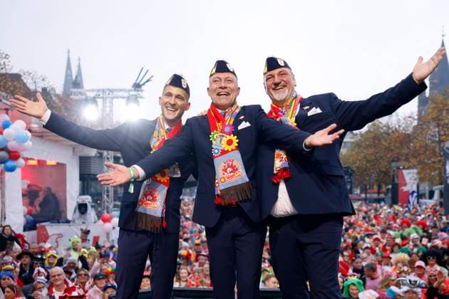 The Cologne triumvirate for the coming session consisting of Prince Rene I center, Rene Klöver , Farmer Michael right, Michael Samm and Maid Marlis left, Hendrik Ermen present themselves on stage at the kick-off of the carnival season at Heumarkt Copyright: xChristophxHardtx