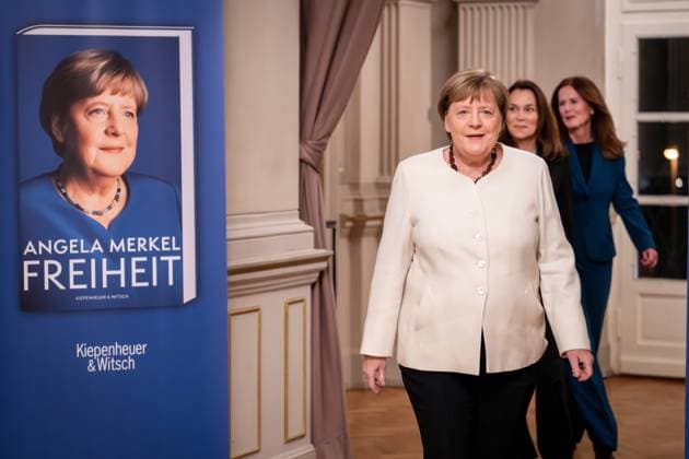 Book Premiere Memoirs Freedom by Dr Angela Merkel Dr Angela Merkel, former German Chancellor on her arrival at the photocall together with Anne Will, journalist and host of the evening and Kerstin Gleba, publisher Kiepenheuer und Witsch and the logo an image of her new book at the book prem