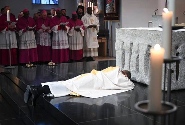 Rottenburg District Tuebingen 01 12 2024 Episcopal Consecration Praelat Dr Klaus Kraemer is consecrated by Archbishop Stephan Burger Archdiocese of Freiburg as 12 Bishop of the Diocese of Rottenburg Stuttgart, at the Litany of All Saints Dr Klaus Kraemer lies before the altar