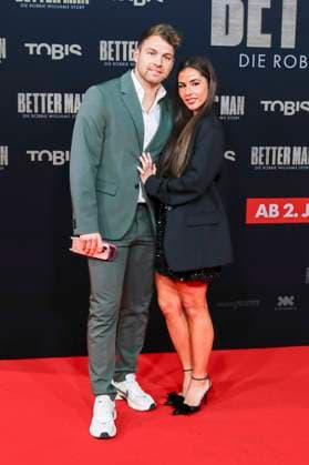 Sarah Engels with husband Julian Engels at the premiere of the movie Better Man The Robbie Williams Story at Cinedom Cologne, 08 12 2024 Foto:xR.xSchmiegeltx xFuturexImagex better_man_4239