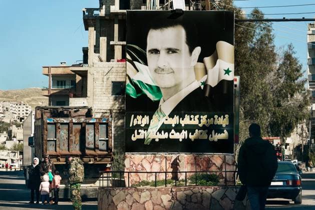Large posters with the portrait of President Bashar al Assad, road to Damascus, Syria
