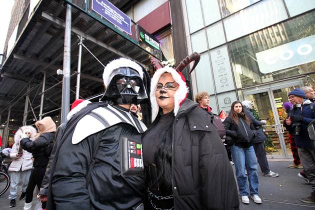 December 14, 2024, Manhattan, New York, USA: New York, New York, December 14, 2024 . Santa Con 2024 NYC. SantaCon is a charitable, non-political, nonsensical Santa Claus convention that happens once a year to fund art & spread absurdist joy. Manhattan U.S.A - ZUMAct2_ 20241214_faf_ct2_047 Copyright: xBrucexCotlerx