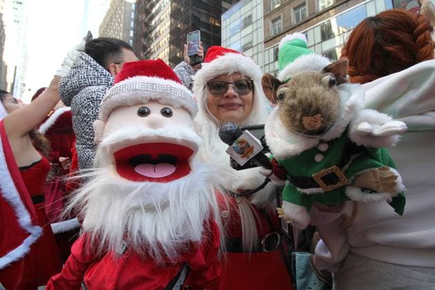 December 14, 2024, Manhattan, New York, USA: New York, New York, December 14, 2024 . Santa Con 2024 NYC. SantaCon is a charitable, non-political, nonsensical Santa Claus convention that happens once a year to fund art & spread absurdist joy. Manhattan U.S.A - ZUMAct2_ 20241214_faf_ct2_050 Copyright: xBrucexCotlerx