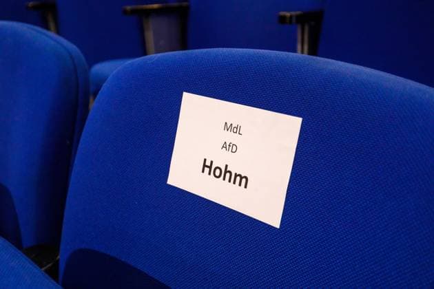 Symbol photo Jean Pascal Hohm DEU Germany Brandenburg Cottbus, 08 01 2025, The name Hohm Jean Pascal Hohm, MdL can be read on a sign on a seat in the Cottbus town hall Jean Pascal Hohm is a politician of the AFD Alternative for Germany and a member of the Brandenburg state parliament AF_Cottbus_2025_52050.jpeg